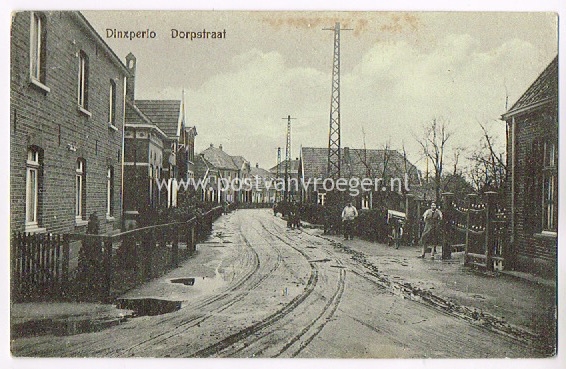 oude ansichtkaarten Dinxperlo: Grensstraat (Dorpstraat) na regenbui uitgave L. Jacobi